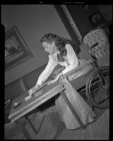 Susan Peters, actress, playing cards, circa 1947-1948