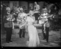 Janet Blair dancing and singing in front of a band in Two Yanks in Trinidad, 1941
