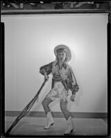 Actress dressed in a cowgirl costume, 1940s
