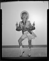 Actress dressed in a cowgirl costume, 1940s