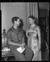 Betta St. John conversing with a man on the set of The Saracen Blade, 1953