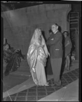 Rita Hayworth and man on the set of Salome, 1952