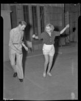 Cast members practicing choreography during filming of Start Cheering, 1937