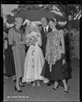 Audrey Totter, actress, with others celebrating her wedding day, 1952