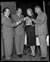 Constance Towers, singer and actress, with actor and comedian Jack Carson and two others, circa 1953-1955