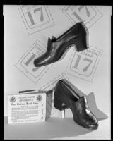 Shoes displayed with a World War II ration book, 1940s
