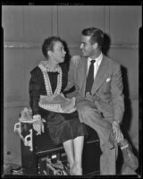 Ellen Corby gazing at a man on the set of Harriet Craig, 1950