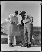 Tim Holt and his father Jack Holt, actor, at their home with a kite, Santa Monica, circa 1934