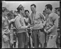 Tom Harmon and fellow cast members in Harmon of Michigan, 1941