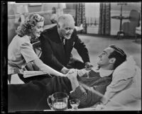 Tom Harmon, Anita Louise and fellow cast member in Harmon of Michigan, 1941