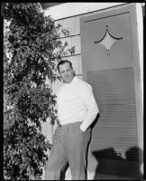 Jack Holt, actor, in his yard, Santa Monica, 1934
