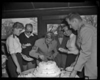 Tyrone Power celebrating his birthday with Betsy Palmer, John Ford, Maureen O’Hara, Philip Carey and others, during filming of the Long Gray Line, 1954