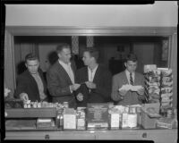 William Leslie, Philip Carey, Robert Francis and Patrick Wayne, souvenir shopping while on location at West Point for The Long Gray Line, 1954