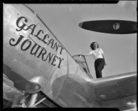 Woman standing atop a plane with the title, "Gallant Journey” painted on it, 1946