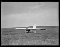 Man in a glider in a field (possibly during the filming of Gallant Journey), 1946