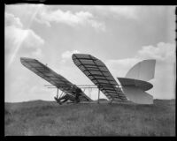 Man in a glider in a field (possibly during the filming of Gallant Journey), 1946