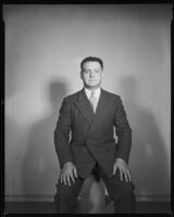 Man (possibly Joe Cook) wearing a suit, circa 1926-1939