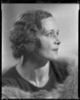 Woman wearing fur stole, circa 1926-1939