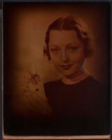 Geneva Mitchell, actress, holding a small case with bottles in it, 1935