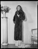 Geneva Mitchell, actress, wearing a fur coat, circa 1931-1936
