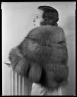 Geneva Mitchell, actress, modeling a fur cape, circa 1931-1936
