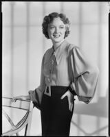 Sheila Mannors, actress, modeling a silk blouse and skirt, 1934