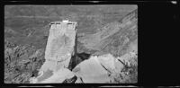 View of the remaining center portion of the St. Francis Dam after its disastrous collapse, San Francisquito Canyon (Calif.), 1928