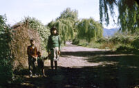 Chile (Curicó) - Fundo Curicó, children standing in dirt lane, between 1966-1967