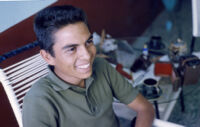 Mexico (Jalisco?) - Young man seated indoors, between 1960-1964
