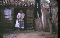 Mexico - Elder woman in doorway of small dwelling, between 1960-1964