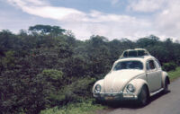 Mexico (Jalisco) - Volkswagen Beetle on roadside with luggage tied to roof, between 1960-1964