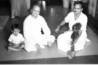 Madhukar Barve playing violin beside his father, Manahar Barve, Mumbai (India), 1963