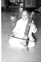 Musician Manahar Barve seated with his dilrubā, Mumbai (India), 1963