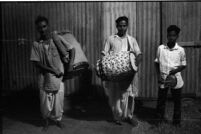 Mahadev Das (dhak), Lakhdan Rai (dhol), Nimai Sardar (kawsi), Durga Puja festival, Mumbai (India), 1963