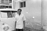Man standing beside the VW van of Nazir Jairazbhoy, Mumbai (India), 1963-1964