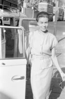 Woman standing beside a VW van, Mumbai (India), 1963-1964