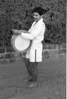 Halgi player in the forecourt of the Mahalakshmi Temple, Kolhapur (India), 1963