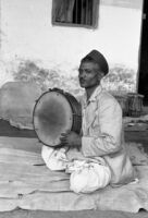 D. G. Kadam with a daf, Miraj (India), 1963
