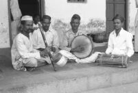 S. Jadav (tuntune), S. K. Ghadge, D. G. Kadam (singer & daf), and B. Jadav (dholki), Miraj (India), 1963