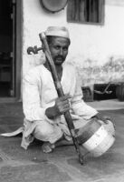 S. Jadav holding a tuntune, Miraj (India), 1963