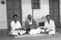 Musicians, M. M Naik, G. Pawar, and M. L. Shaluka,  holding a dimdi, an ektar and a jhanjh, Miraj (India), 1963