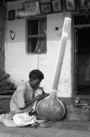 Insrument makers scribing decoration at the shop of Abdul Karim Ismail, instrument maker, Miraj (India), 1963