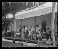 Customers at a cafe, Guatemala, 1914