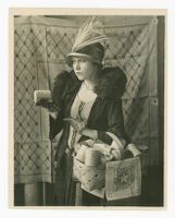 Woman with Basket of Milk Cans